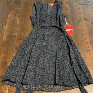 New, sleeveless wrap dress in leopard print, size 8.